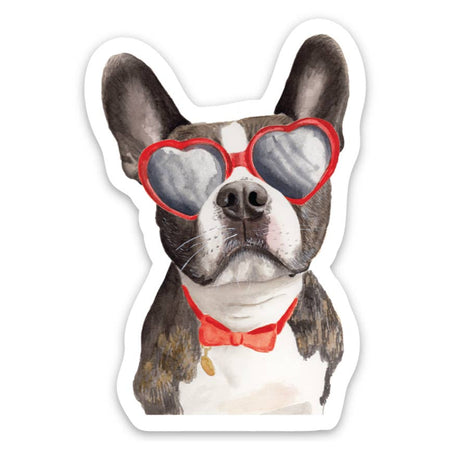 Sticker in the image of a brown and white French bulldog wearing a red bowtie and red heart sunglasses.