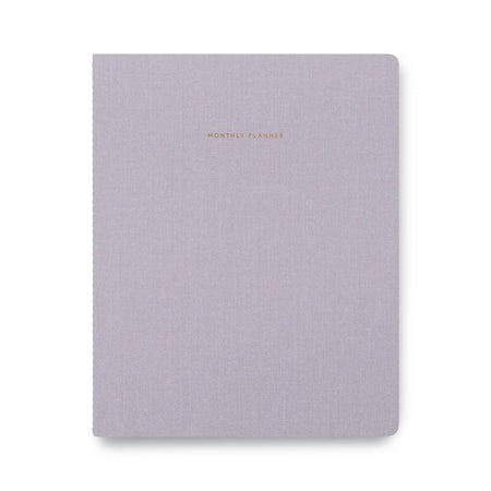 Lavender gray cover with gold foil text saying, “Monthly Planner” in top center.