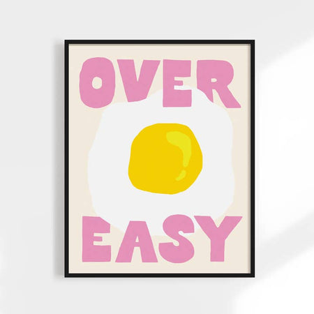 Ivory background with pink text saying, “Over Easy”. Image of an over easy egg.