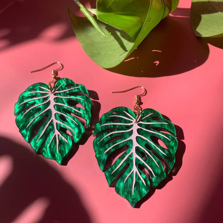 Set of earrings in the image of green leaves from the monster plant.