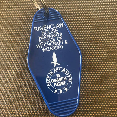 Blue vintage style motel key fob with white text featuring Ravenclaw House from Harry Potter.