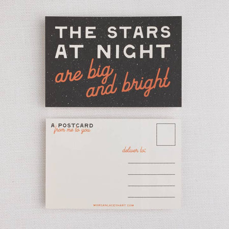Black postcard with images of stars in the night sky with white and orange text saying, “The Stars at Night Are Big and Bright”.