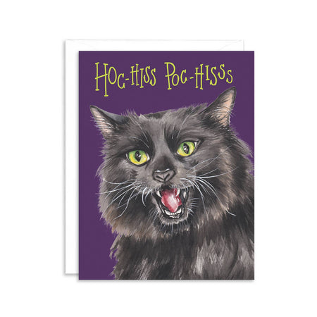 Purple card with yellow text saying, “Hoc-Hiss Poc-Hiss”. Image of a black cat with yellow eyes in center of card. A white envelope is included.