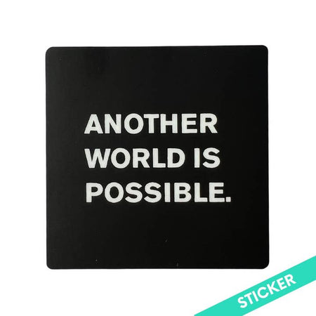 Black square sticker with white text saying, “Another World Is Possible”.