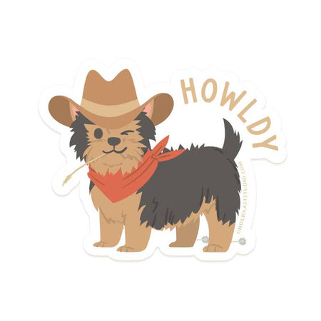 Sticker with white background and image of a brown dog wearing a red handkerchief around its neck and a brown cowboy hat. Brown text saying, “Howldy”. 