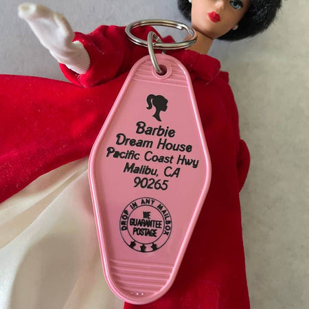 Pink vintage style motel key fob featuring Barbie's Dreamhouse.