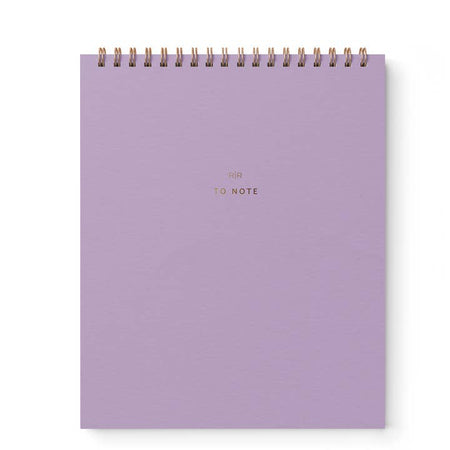 Purple lavender notebook with gold foil text saying, 