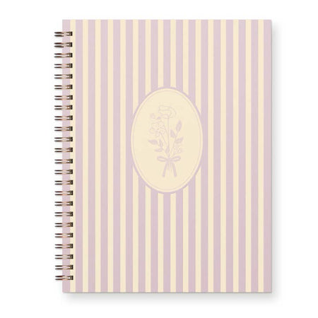 Ivory journal with vertical light purple stripes with an oval in the middle. Image of bouquet of flowers in center of oval. Bronze coil binding on left side.