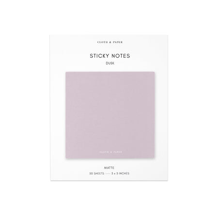 Square sticky notes in a dusk pink color.