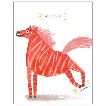 White card with red text saying, “You Did It!” Image of a red and white striped zebra smiling and kicking up back feet. A matching envelope is included.