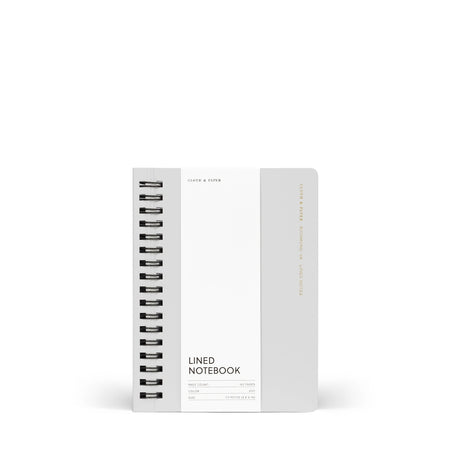 Notebook in ash white color with coil spine on left side.