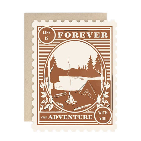 White card in the image of a tan and brown postage stamp. Images of a campsite with tent, campfire, and pine trees. White text saying, 