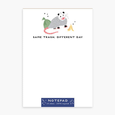 White notepad with black text saying, “Same Trash Different Day”. Images of an opossum with a trash bag and a banana peel.