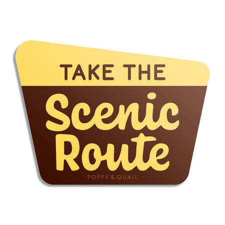 Brown and yellow sticker with brown and yellow alternating text saying, “Take the Scenic Route”.