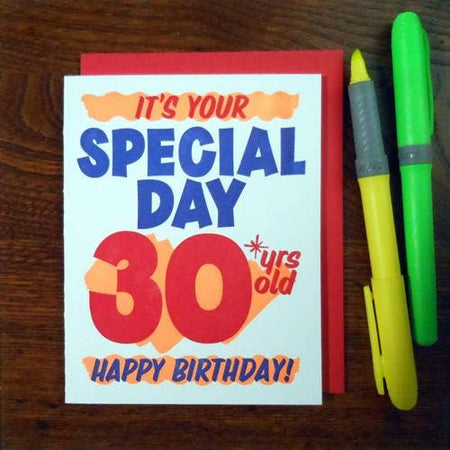 White card with red and blue text saying, “It’s Your Special Day 30 years old Happy Birthday!” Text designed to look like a grocery store special sale sign. A red envelope is included.