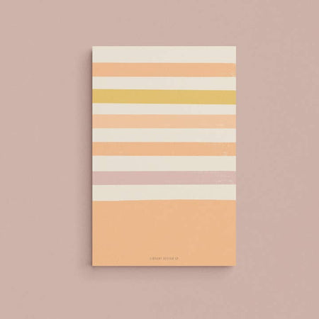 Pink pad with tan, purple, orange and pink horizontal stripes.