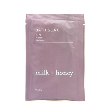 Purple envelope with white text saying, “Bath Soak No 8 Lavender Eucalyptus Milk + Honey”.