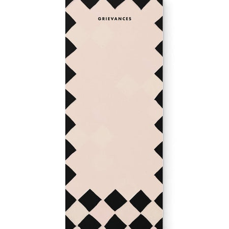 Vertical ivory notepad with black checkered border and black text saying, “Grievances”.