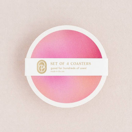 Circle coasters with pink gradient colors.